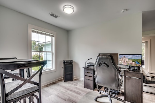 office space featuring light wood-type flooring