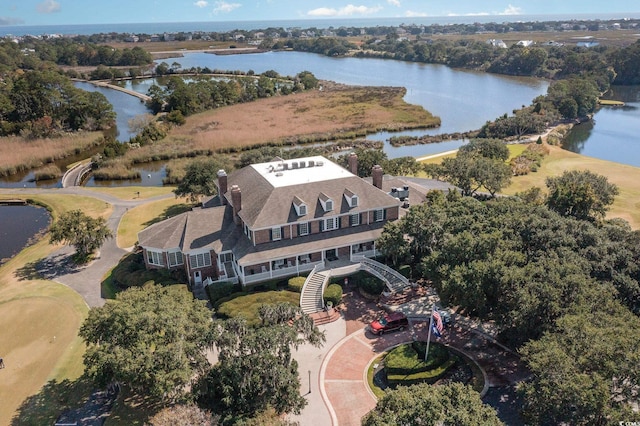 drone / aerial view with a water view