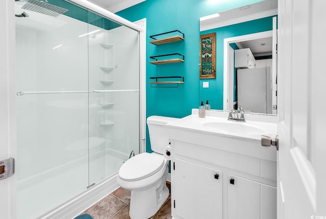 bathroom with vanity, an enclosed shower, crown molding, tile patterned floors, and toilet