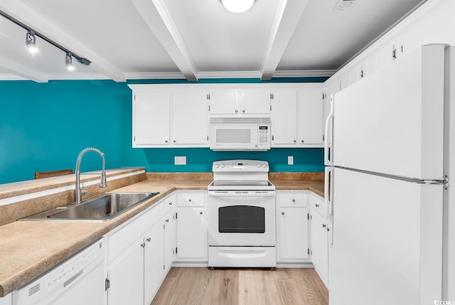 kitchen featuring white cabinetry, white appliances, and sink