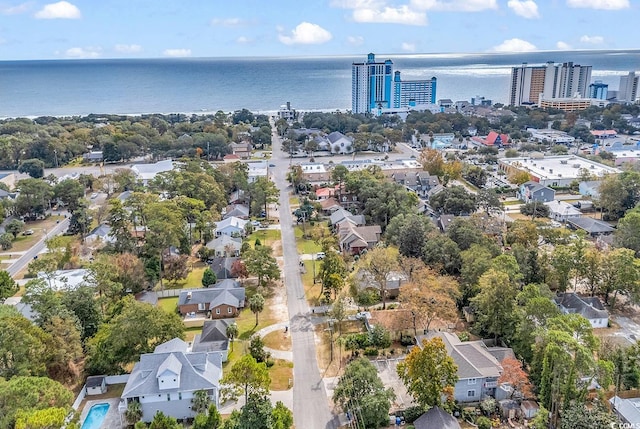 drone / aerial view with a water view