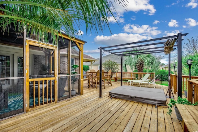 wooden deck featuring a pergola