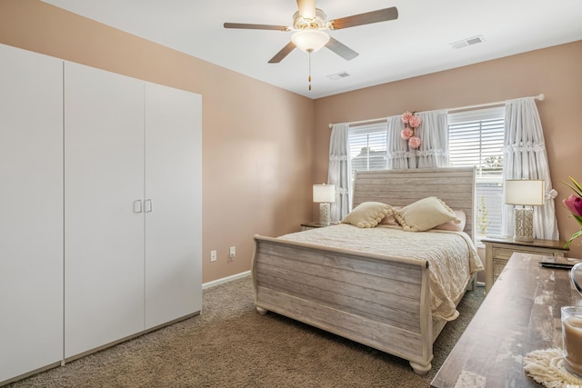 carpeted bedroom featuring ceiling fan