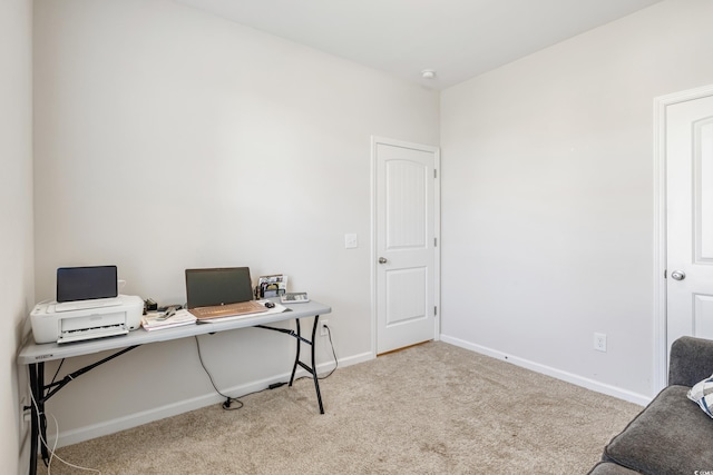 home office with light colored carpet