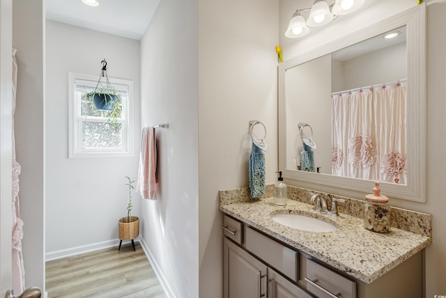 263 Red Maple Loop, Longs, SC 29568 - bathroom with baseboards, vanity, wood finished floors, and recessed lighting