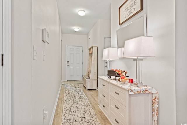 hallway featuring light hardwood / wood-style floors