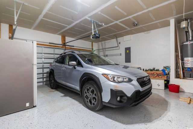 garage with electric panel, stainless steel fridge, gas water heater, and a garage door opener