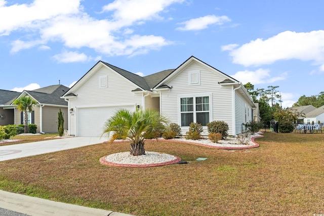 view of front of property with a front yard and a garage