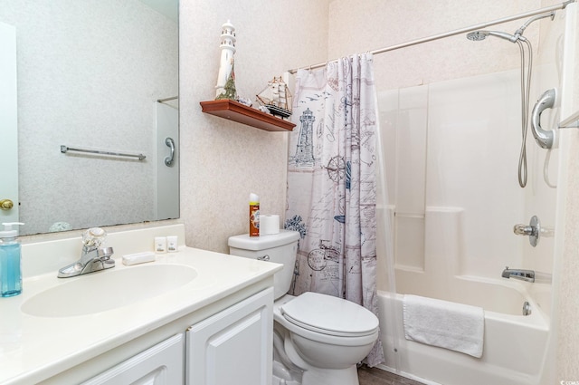 full bathroom with vanity, toilet, and shower / tub combo