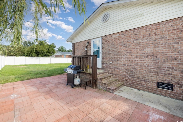 view of patio with a grill