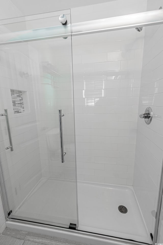 bathroom with an enclosed shower