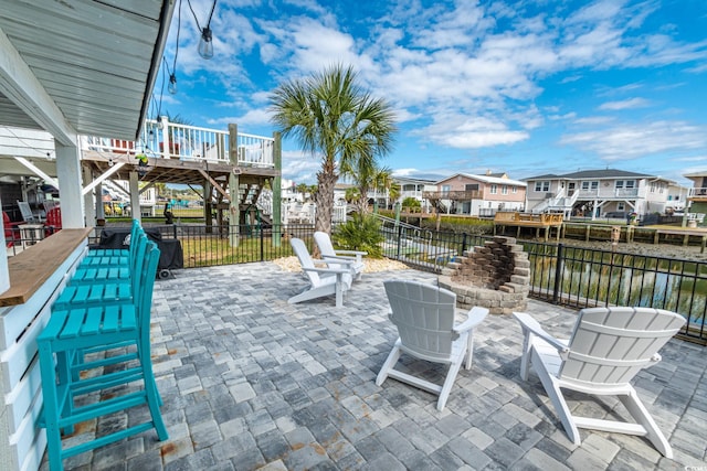 view of patio / terrace featuring a water view