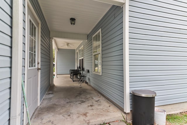 view of property exterior with a porch