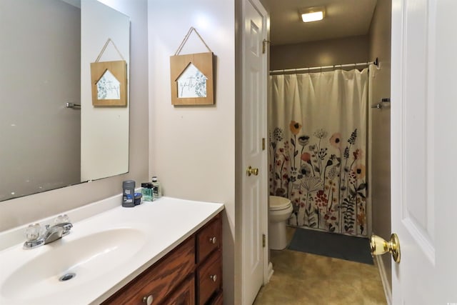 bathroom featuring curtained shower, vanity, and toilet