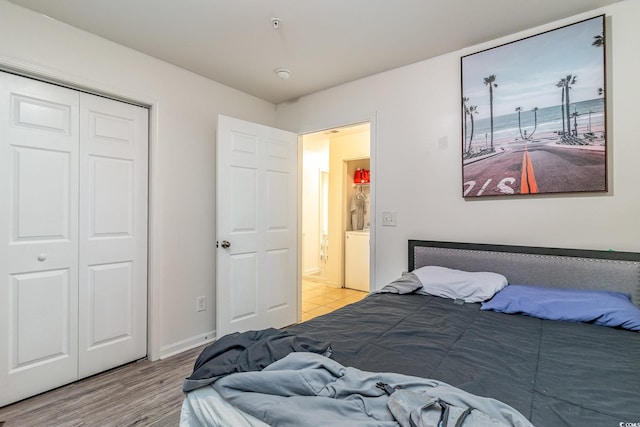 bedroom with a closet and light wood-type flooring