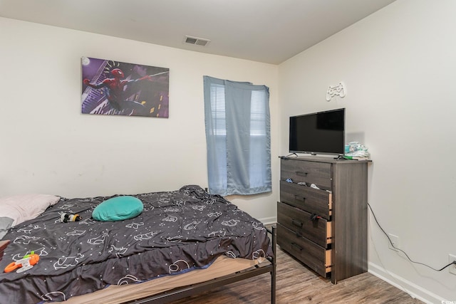 bedroom featuring light hardwood / wood-style flooring