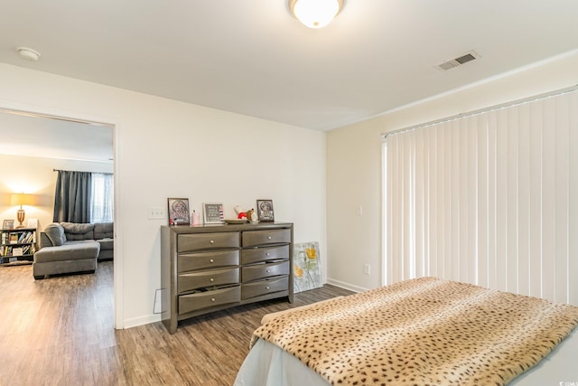 bedroom featuring hardwood / wood-style floors