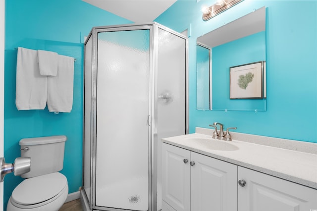 5601 N Ocean Blvd Unit C-202, Myrtle Beach, SC 29577 - bathroom with vanity, a shower stall, and toilet