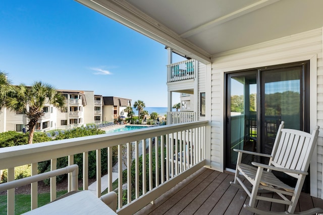 5601 N Ocean Blvd Unit C-202, Myrtle Beach, SC 29577 - balcony featuring view of pool area