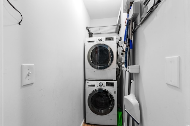 5601 N Ocean Blvd Unit C-202, Myrtle Beach, SC 29577 - washroom with stacked washer / drying machine