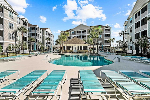 view of swimming pool with a patio