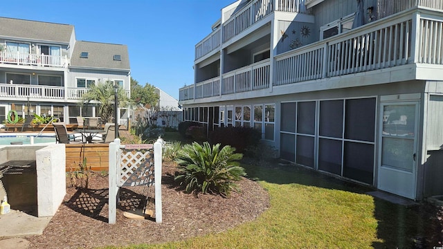 surrounding community featuring a yard and a pool