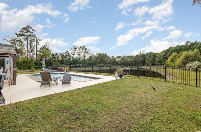 view of yard featuring a patio and a fenced in pool