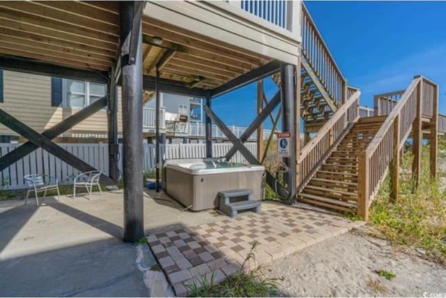 view of patio / terrace featuring a hot tub