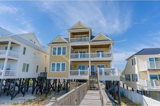 rear view of house with a balcony