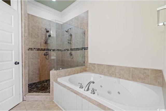 bathroom featuring crown molding, shower with separate bathtub, and tile patterned floors