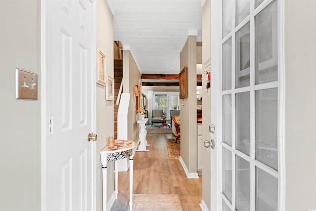 hall with light wood-type flooring