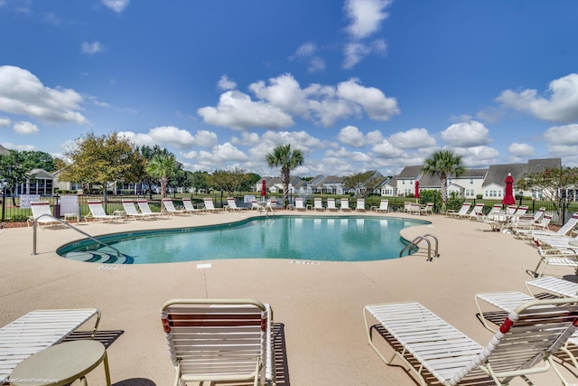 view of pool featuring a patio