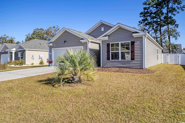 view of front of property with a garage and a front yard