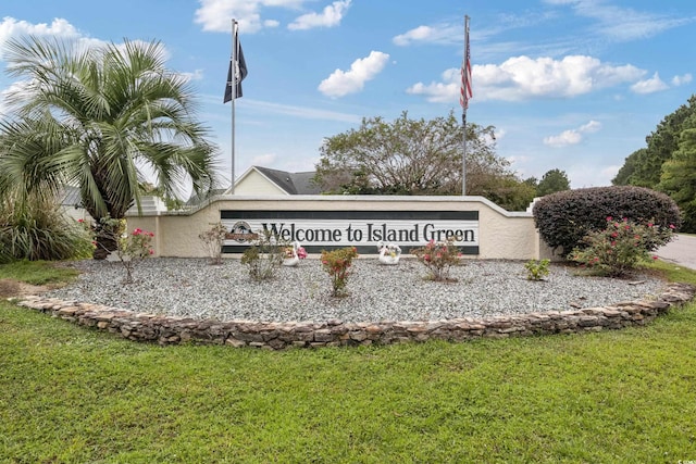 community sign with a lawn