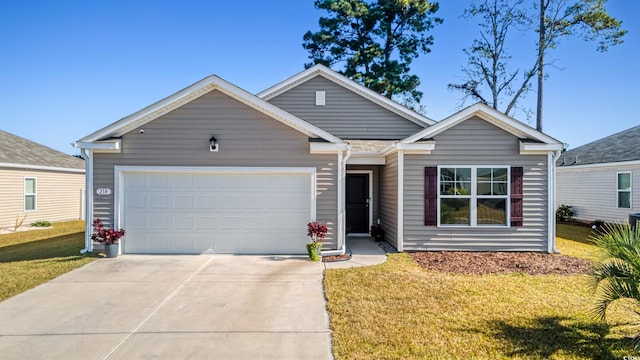 view of front facade with a garage and a front yard