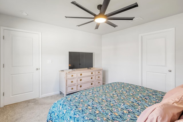 carpeted bedroom featuring ceiling fan