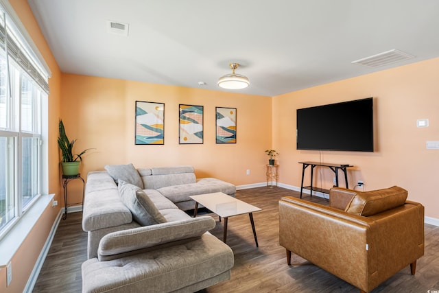 living room with dark wood-type flooring