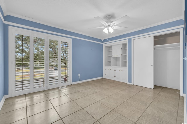 unfurnished bedroom with a textured ceiling, ceiling fan, crown molding, and light tile patterned flooring