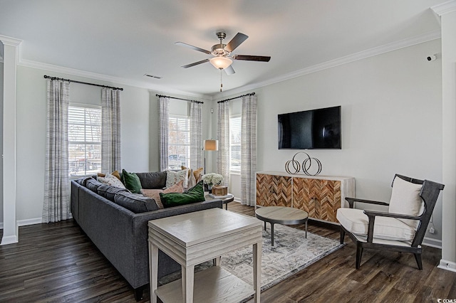 living room featuring ceiling fan, ornamental molding, and dark hardwood / wood-style floors