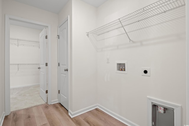 299 Hayloft Cir, Conway, SC 29526 - kitchen featuring white cabinetry, appliances with stainless steel finishes, pendant lighting, light hardwood / wood-style floors, and a center island