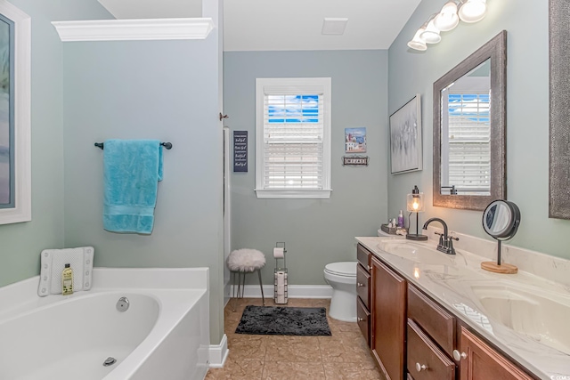 bathroom featuring a tub to relax in, vanity, toilet, and tile patterned flooring