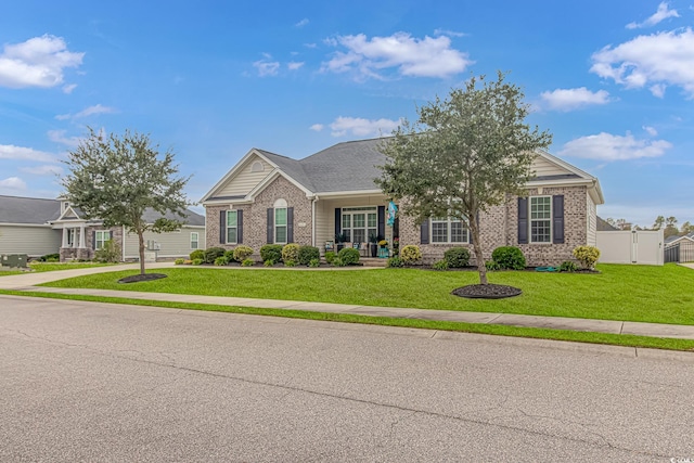 view of front of property featuring a front yard