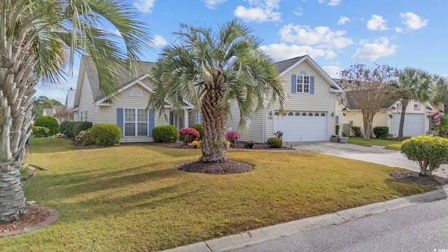 view of front of property with a garage and a front lawn