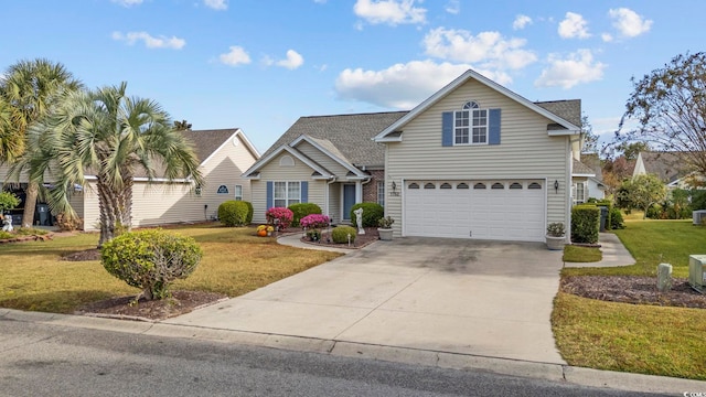 front of property featuring a garage and a front lawn