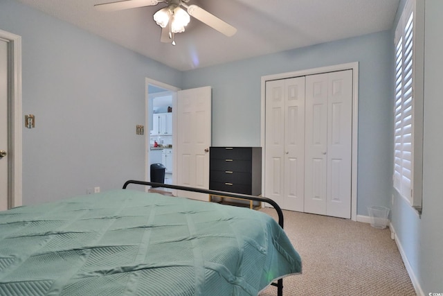 bedroom with carpet floors, a closet, and ceiling fan