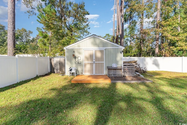 view of outdoor structure with a yard