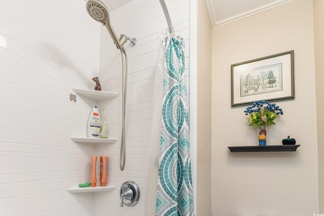 bathroom featuring ornamental molding and a shower with curtain