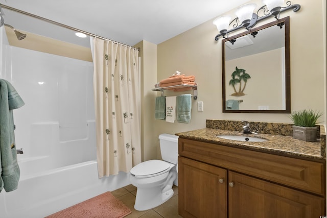 full bathroom featuring toilet, shower / tub combo with curtain, vanity, and tile patterned floors