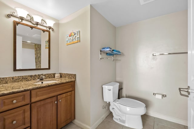 bathroom with vanity, tile patterned floors, a shower with shower curtain, and toilet