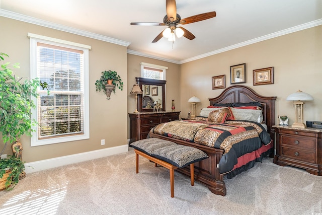 bedroom featuring ceiling fan, light carpet, and ornamental molding